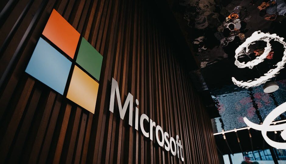 Interior view of Microsoft office with logo on wooden wall in Brussels, Belgium.